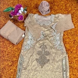 Three piece net suit available in medium size.